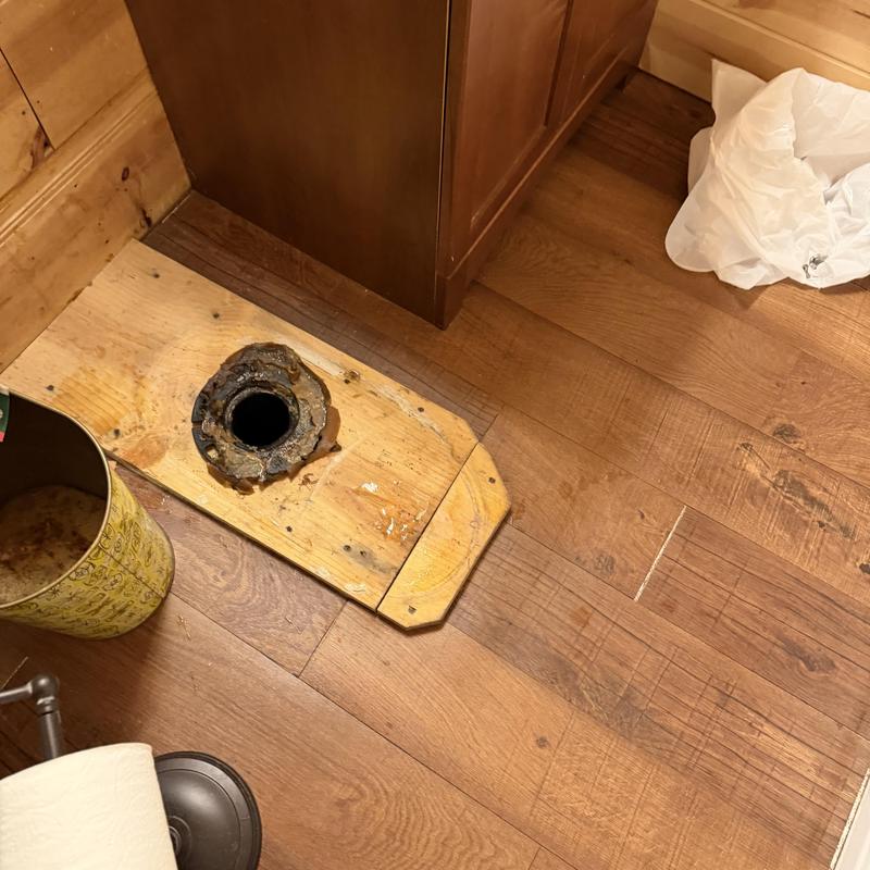 Toilet flange on wood subfloor in bathroom Toilet flange on wood subfloor in bathroom