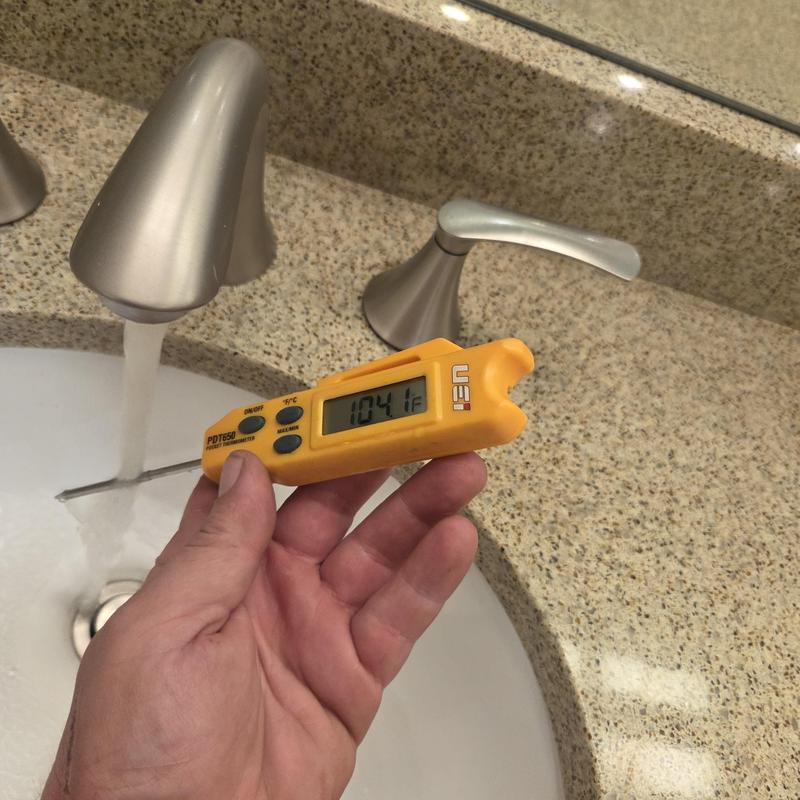 Locker room faucet temperature testing at fitness center sink Locker room faucet temperature testing at fitness center sink