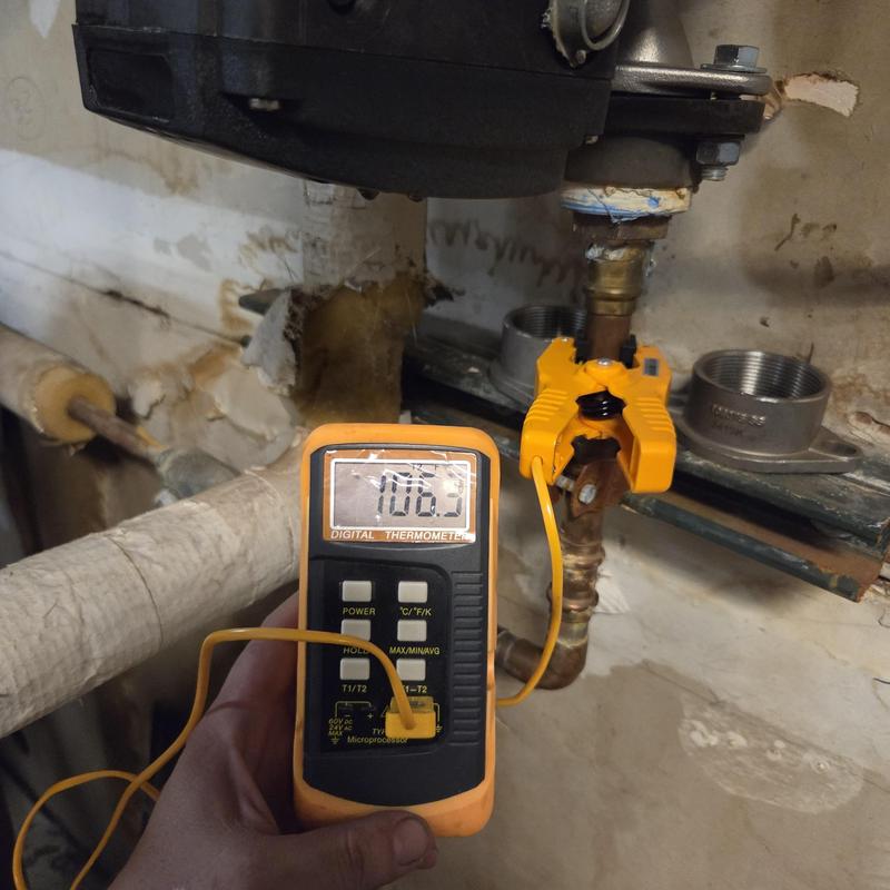 Boiler pipe temperature check with digital thermometer Boiler pipe temperature check with digital thermometer