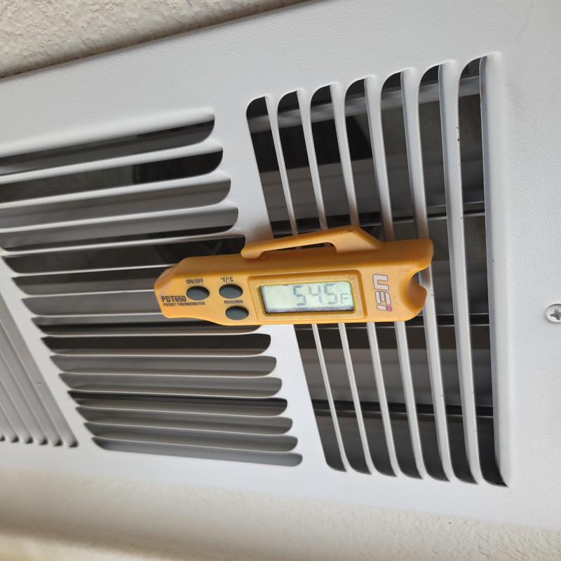 HVAC vent temperature check with digital thermometer HVAC vent temperature check with digital thermometer