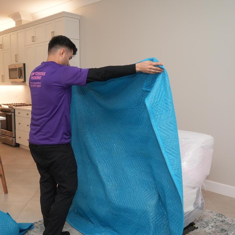 Furniture moving blanket in kitchen during packing