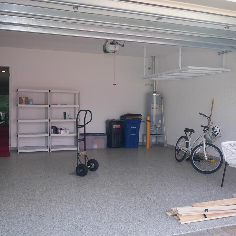 Water heater and garage storage shelves with moving dolly