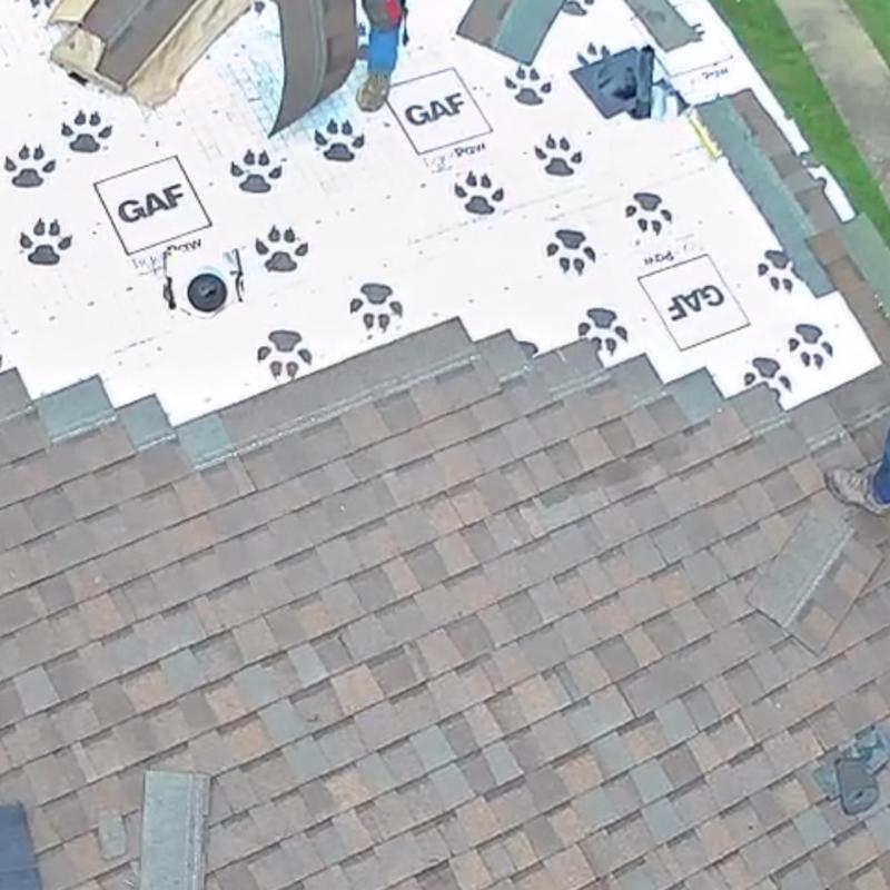 Architectural shingles installation on roof with underlayment Architectural shingles installation on roof with underlayment