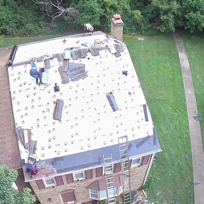 Architectural shingles installation on residential roof Architectural shingles installation on residential roof