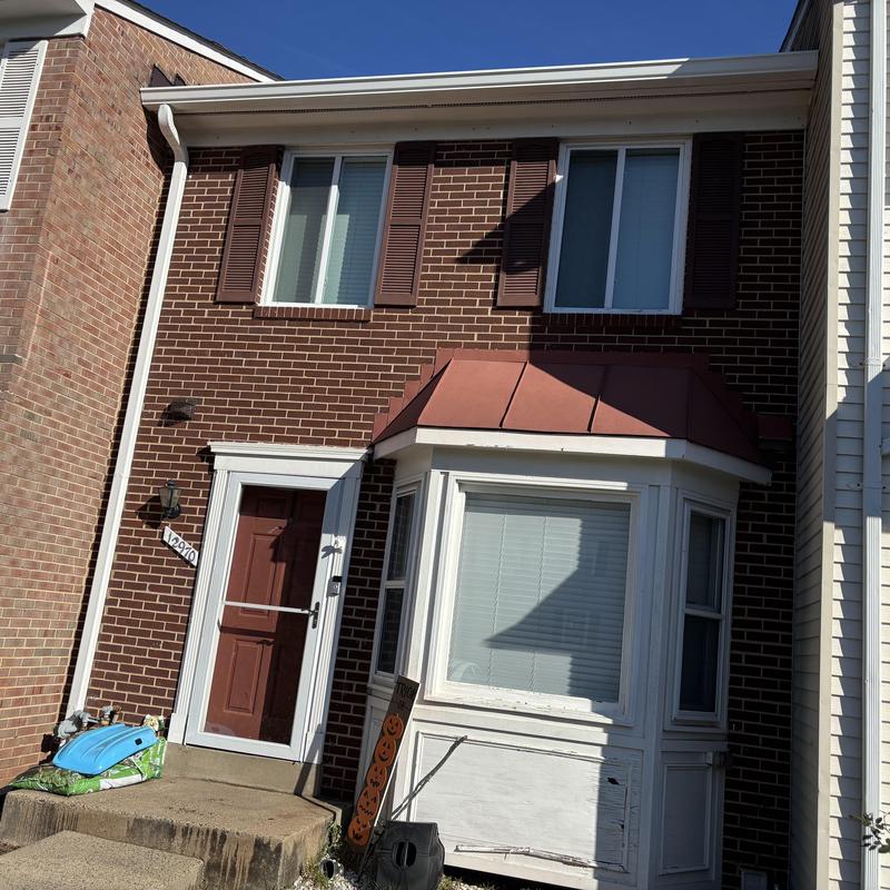 6 inch seamless gutters with new downspouts on brick home 6 inch seamless gutters with new downspouts on brick home