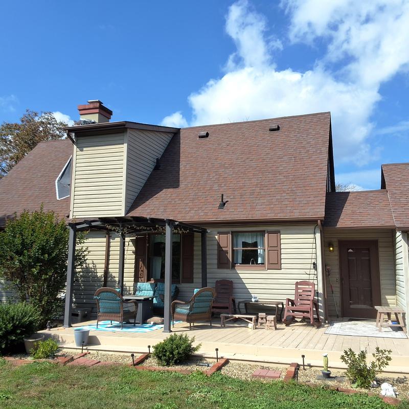 Asphalt shingle roof with outdoor patio furniture