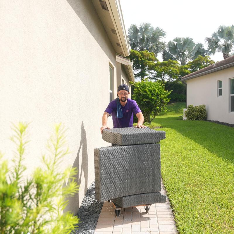 Outdoor wicker patio furniture moving on dolly
