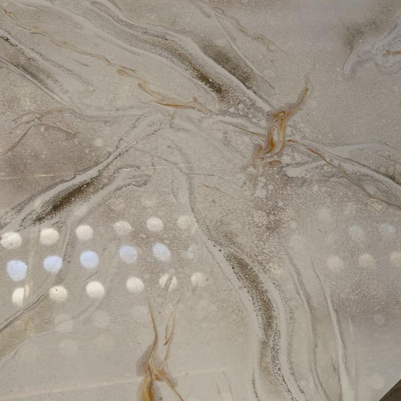 Liquid marble elevator floor with natural veining pattern