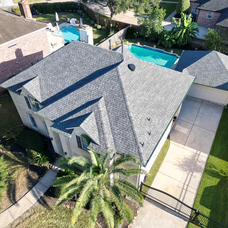 Tamko Titan XT roofing with Urbane Bronze gutters