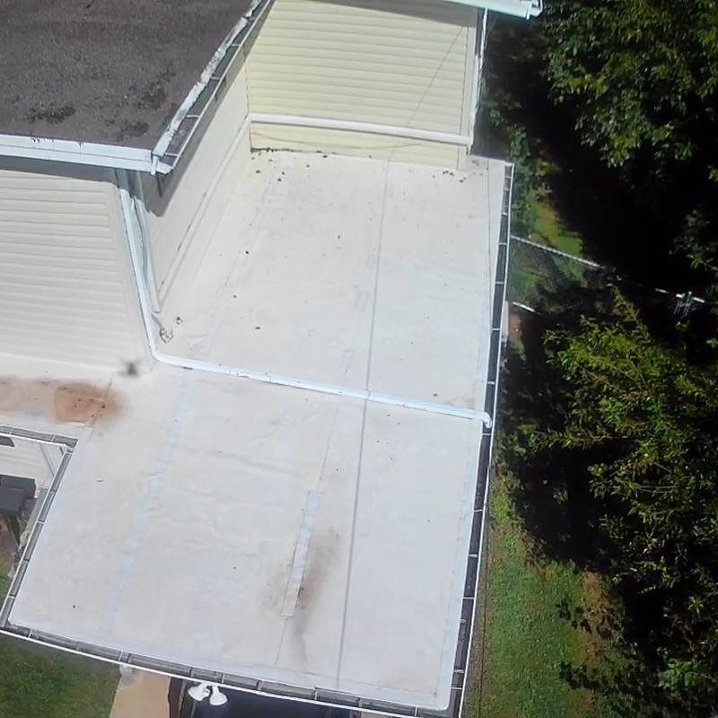 TPO flat roof installation on residential building TPO flat roof installation on residential building