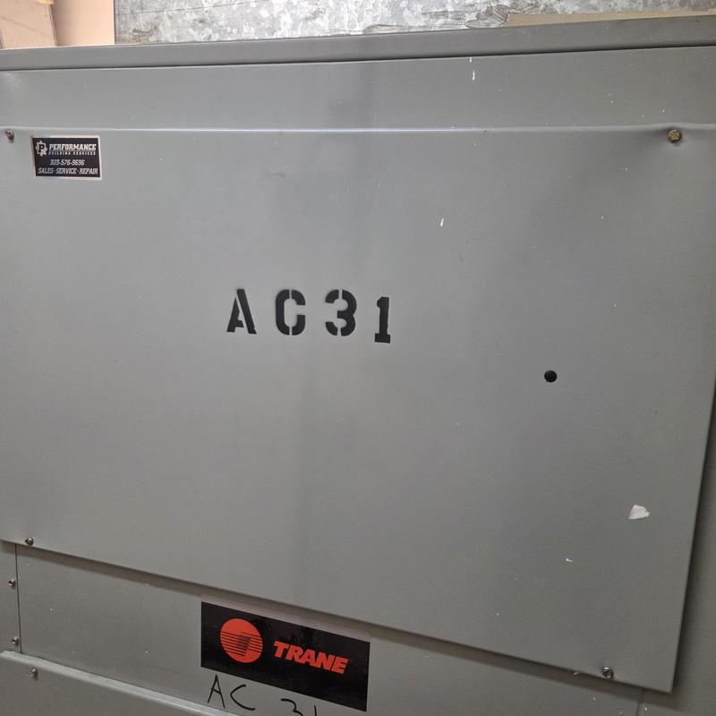 Trane AC unit panel with service label AC31 Trane AC unit panel with service label AC31
