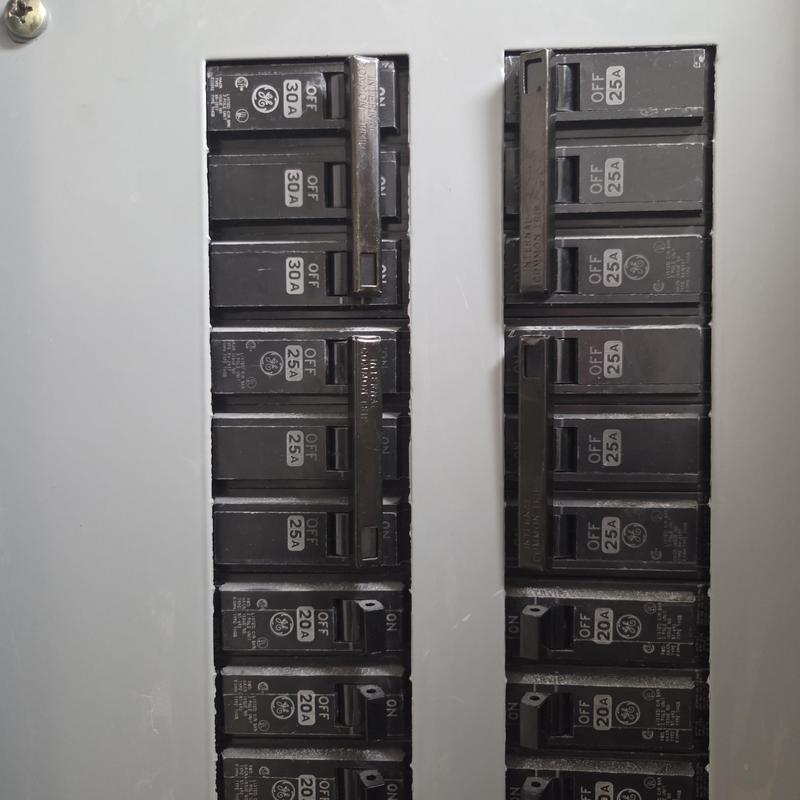 Circuit breaker panel with multiple 25A and 30A breakers Circuit breaker panel with multiple 25A and 30A breakers