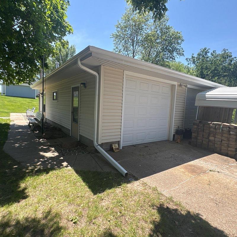 Gutters on residential garage with downspout in Weston, NE Gutters on residential garage with downspout in Weston, NE