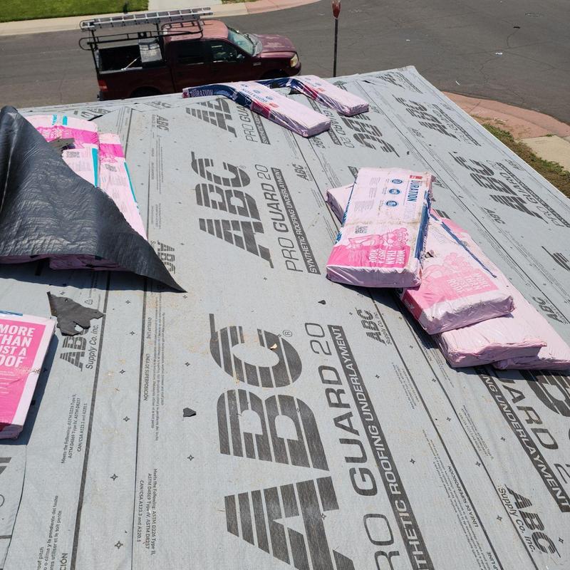 Roofing underlayment with stacked insulation batts Roofing underlayment with stacked insulation batts