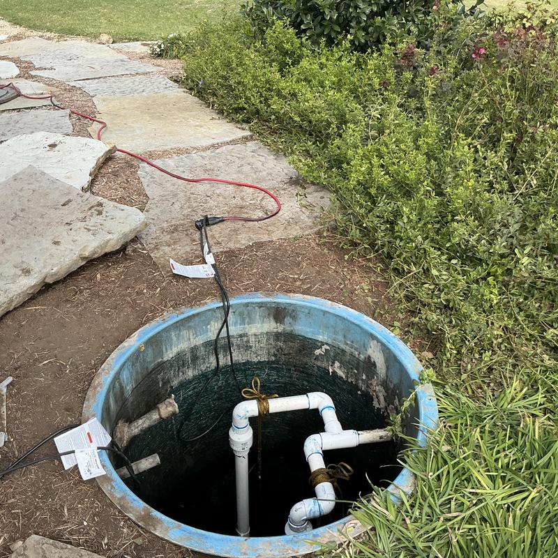 Liberty grinder pump plumbing installation in pit