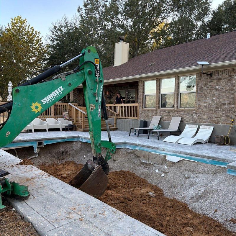 Fiberglass pool removal and backyard backfill with excavator