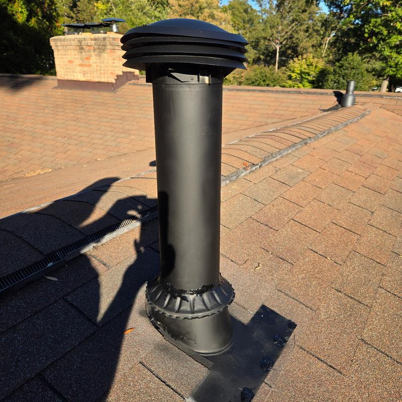 Roof vent pipe with sealed flashing on shingle roof Roof vent pipe with sealed flashing on shingle roof