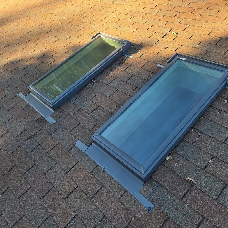 Skylight flashing on asphalt shingle roof repair Skylight flashing on asphalt shingle roof repair