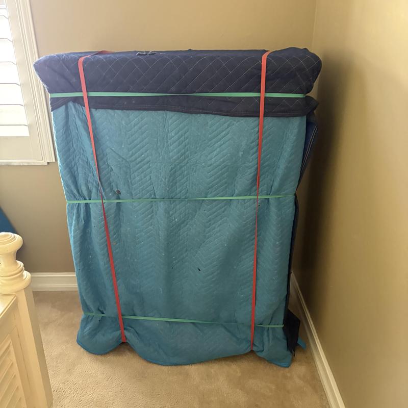 Large safe securely wrapped for moving in Fort Myers