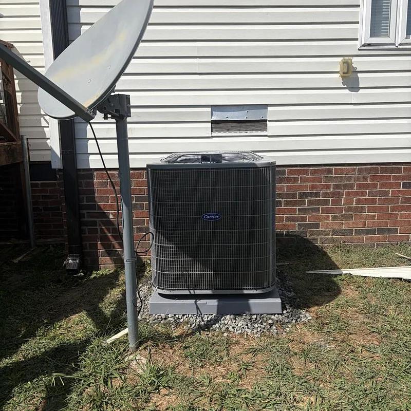 Carrier heat pump unit installed outside home Carrier heat pump unit installed outside home