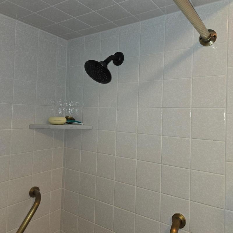 Shower diverter valve in tiled shower stall