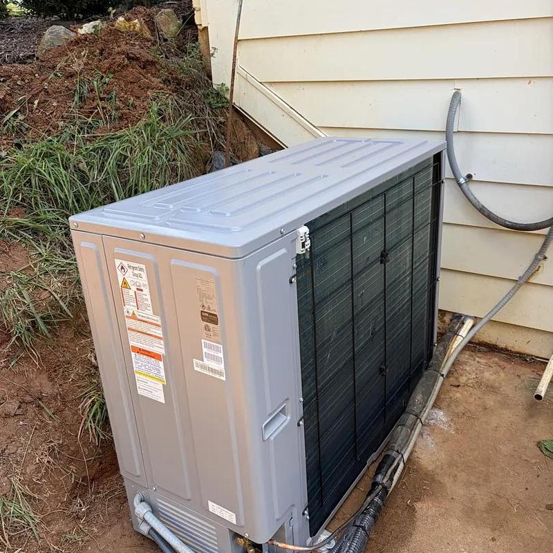 4T Friedrich Breeze Heat Pump installed outside house