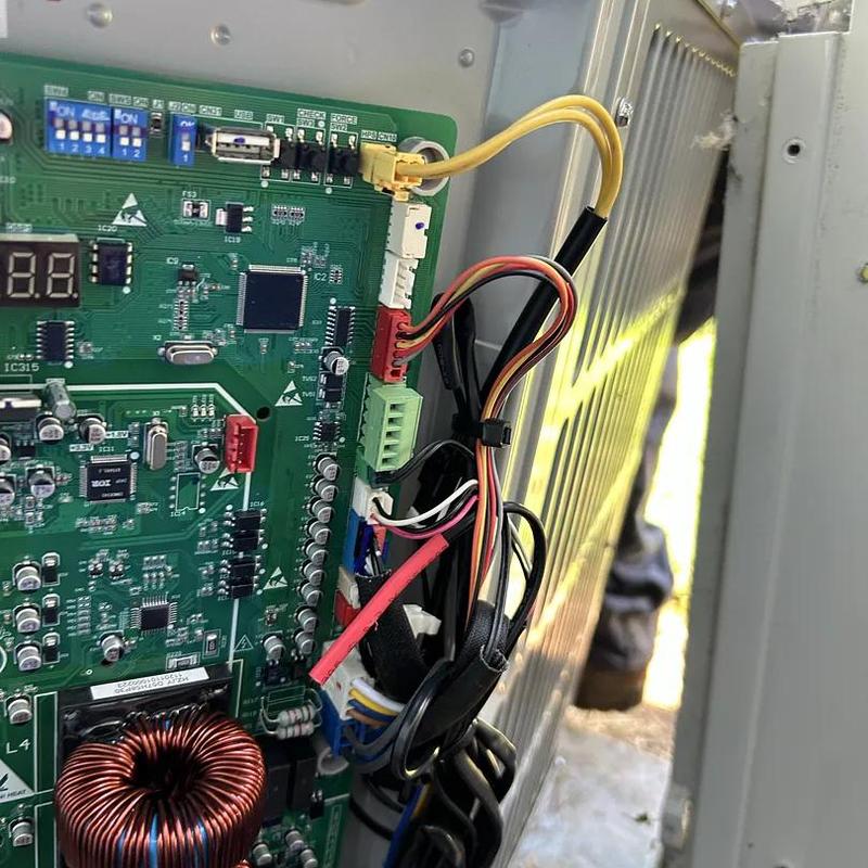 Control board with wiring inside HVAC unit