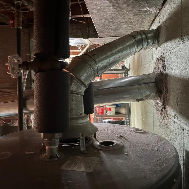 50-gallon water heater with new 4in vent pipe