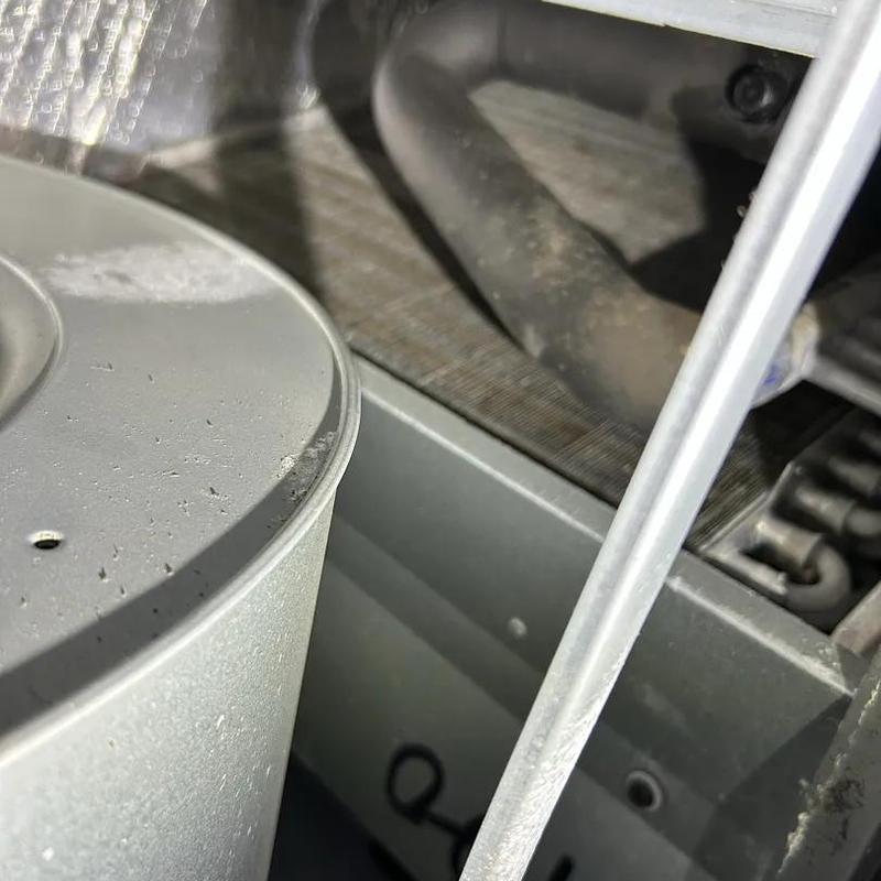Capacitor and HVAC unit interior with clean coils Capacitor and HVAC unit interior with clean coils