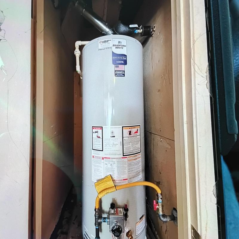 50-gallon gas water heater with code upgrades installed