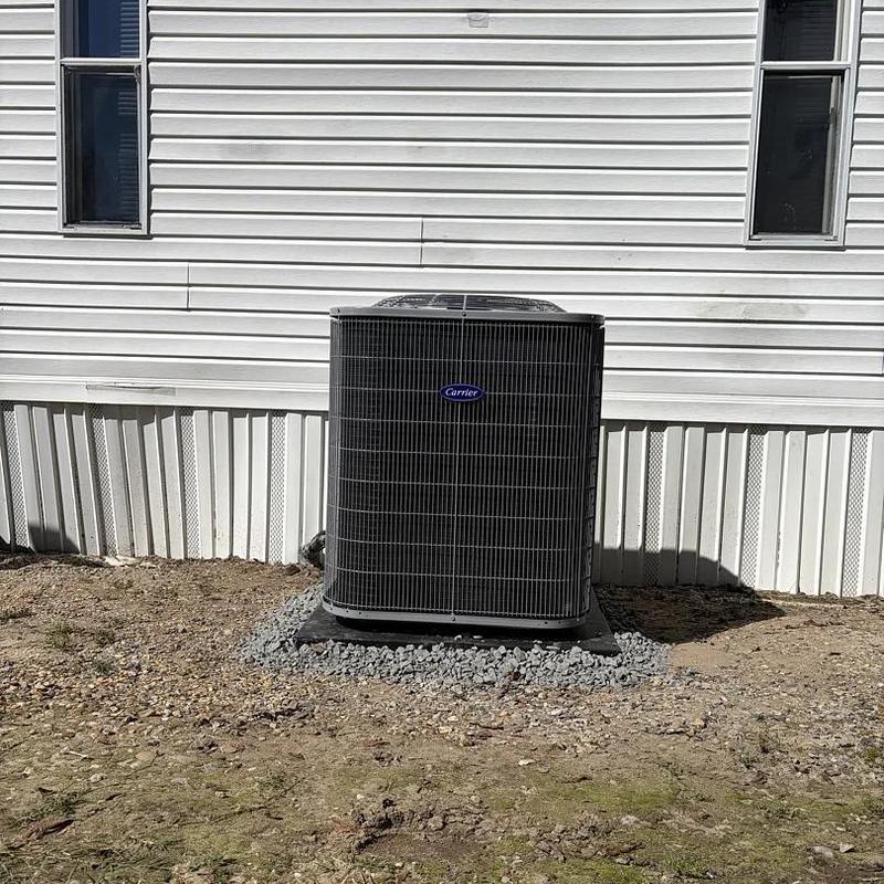 Carrier heat pump unit installed outside home Carrier heat pump unit installed outside home