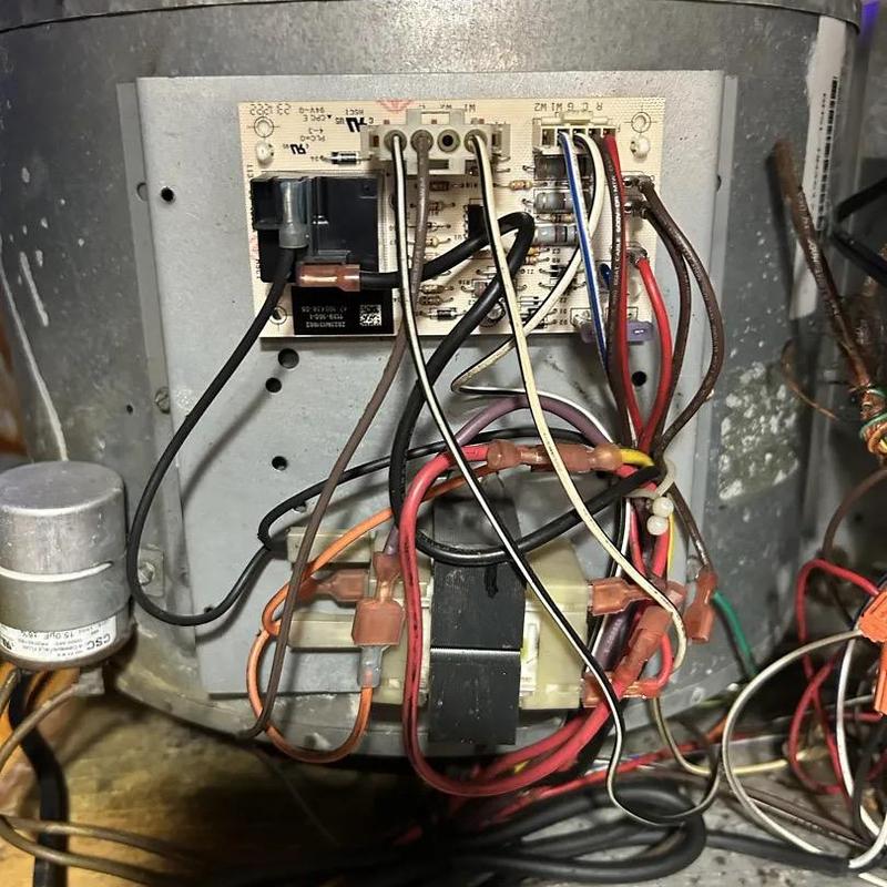 Furnace control board with wiring and capacitor Furnace control board with wiring and capacitor