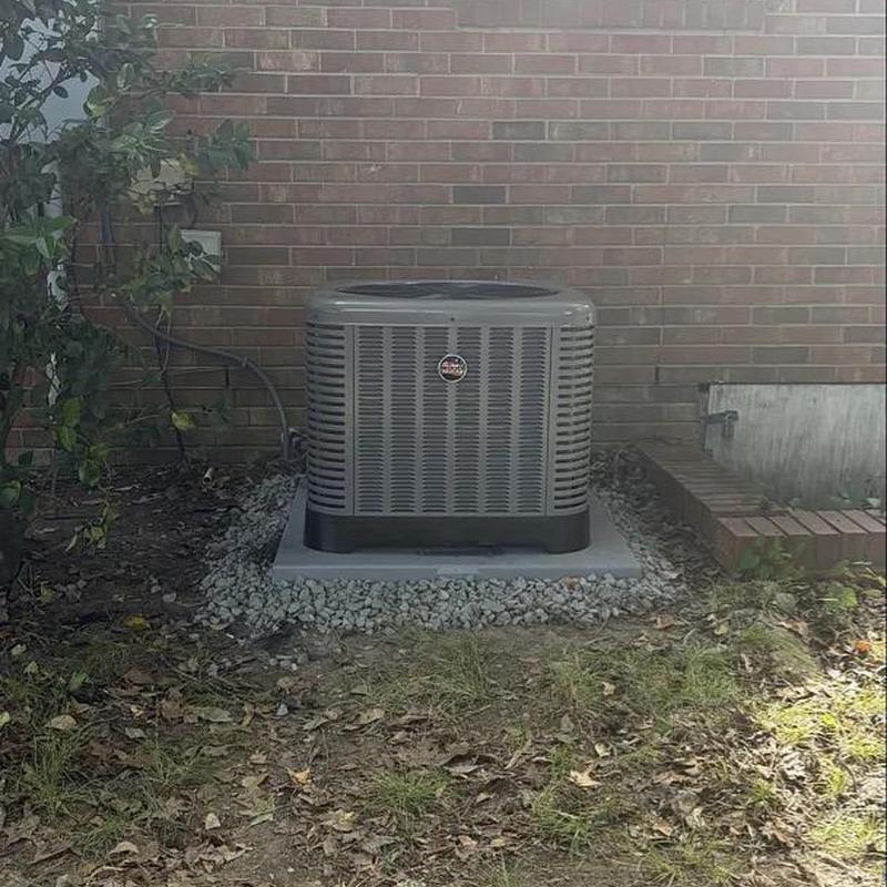 Ruud heat pump unit installed on concrete pad Ruud heat pump unit installed on concrete pad