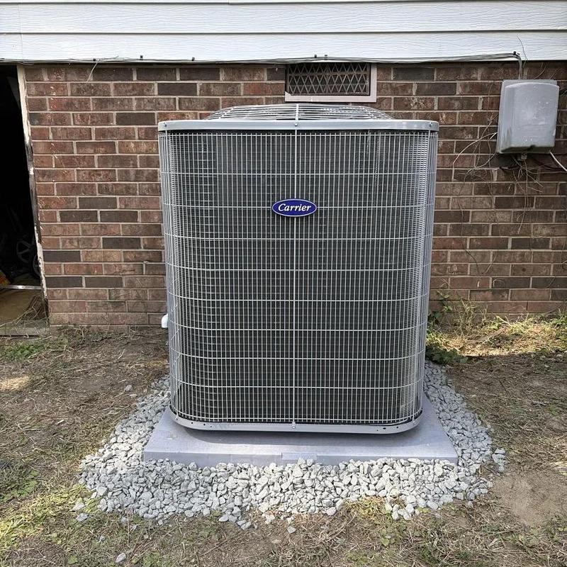 Carrier heat pump unit installed on concrete pad Carrier heat pump unit installed on concrete pad