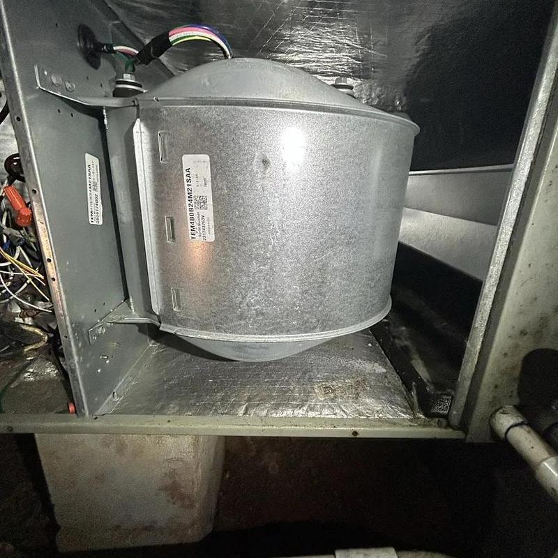 Furnace draft inducer motor inside HVAC system