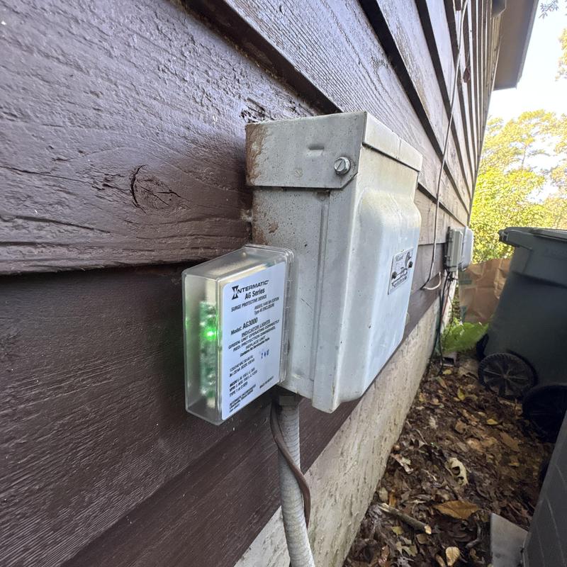 Intermatic outdoor surge protector installation on house exterior Intermatic outdoor surge protector installation on house exterior