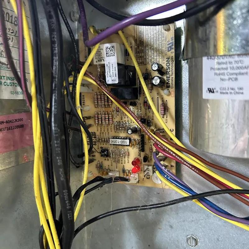 Furnace control board with wiring and components Furnace control board with wiring and components
