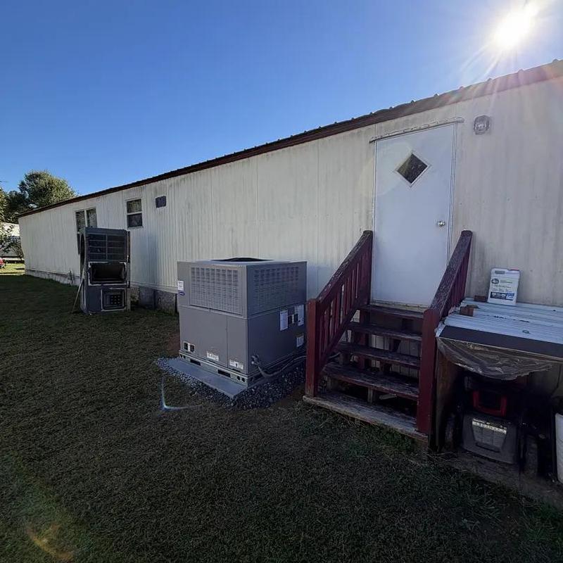 3T Ruud Package Heat Pump installed outside mobile home 3T Ruud Package Heat Pump installed outside mobile home