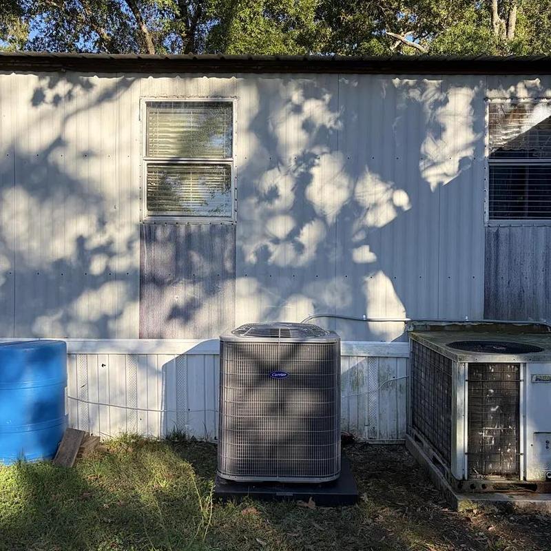 Mobile home heat pump installation outdoors Mobile home heat pump installation outdoors