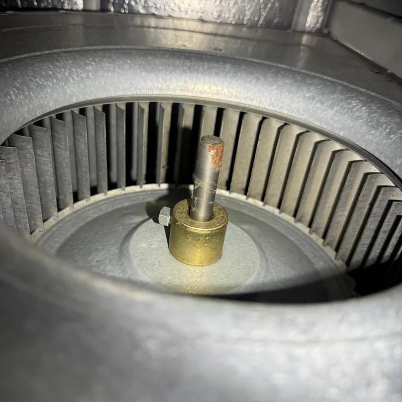 HVAC blower wheel and motor shaft close-up HVAC blower wheel and motor shaft close-up