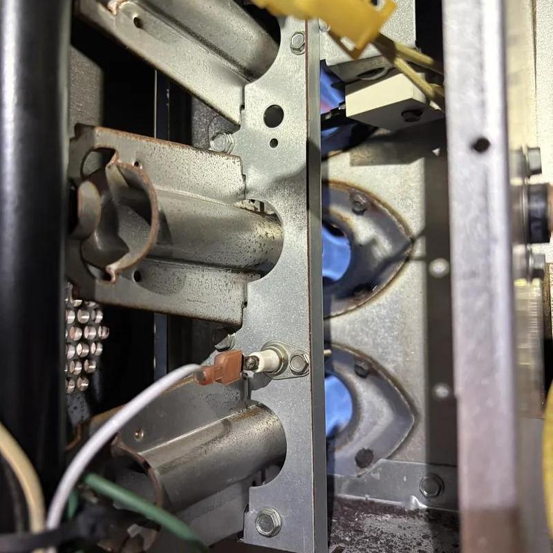 Gas furnace burner assembly with lit burners and wiring Gas furnace burner assembly with lit burners and wiring
