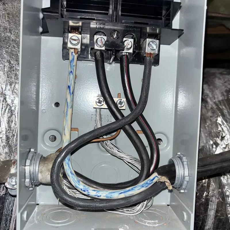 Electrical meter base wiring inside junction box with cables Electrical meter base wiring inside junction box with cables