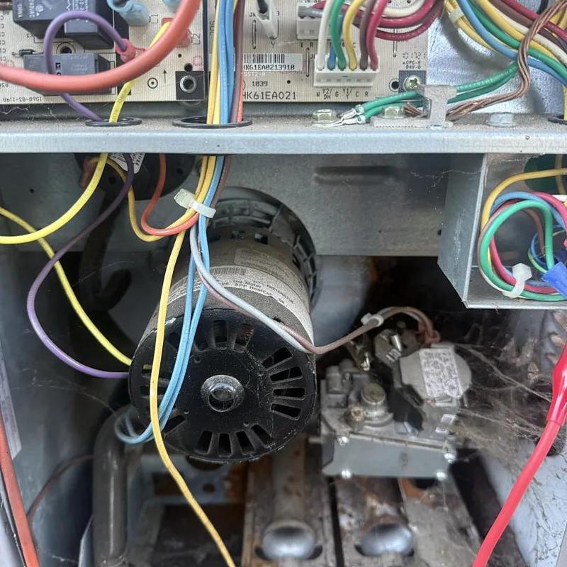 Furnace blower motor with wiring and gas valve components Furnace blower motor with wiring and gas valve components