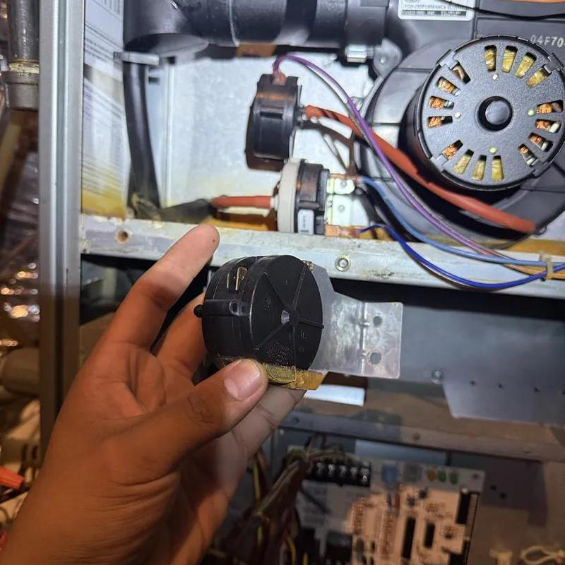 Pressure switch in furnace being held for replacement Pressure switch in furnace being held for replacement