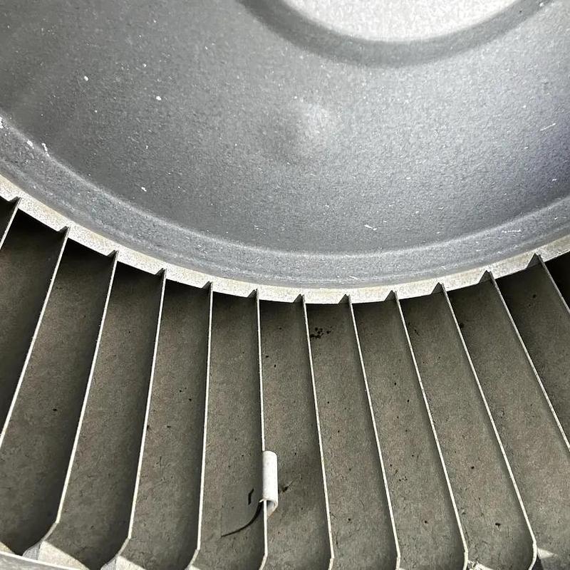 HVAC blower wheel blades and housing close-up view HVAC blower wheel blades and housing close-up view