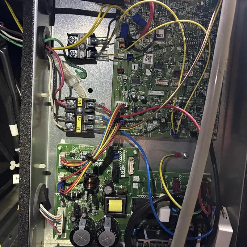 Thermostat control board and wiring inside HVAC unit Thermostat control board and wiring inside HVAC unit