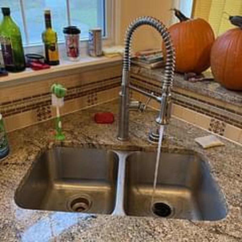 Kitchen faucet with running water and double sink