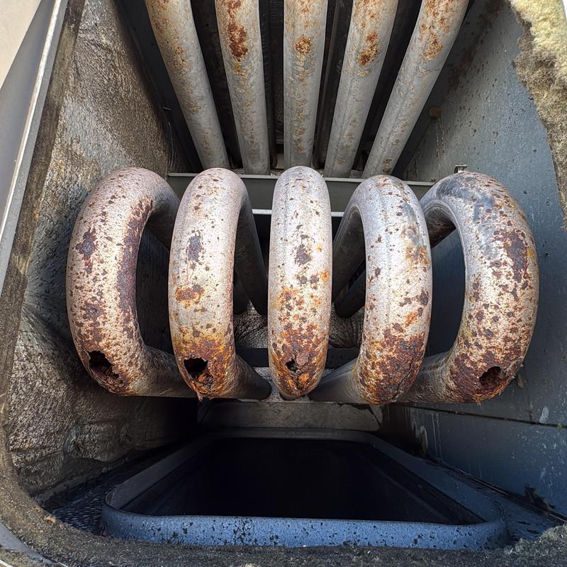 Furnace heat exchanger with severe rust and holes Furnace heat exchanger with severe rust and holes