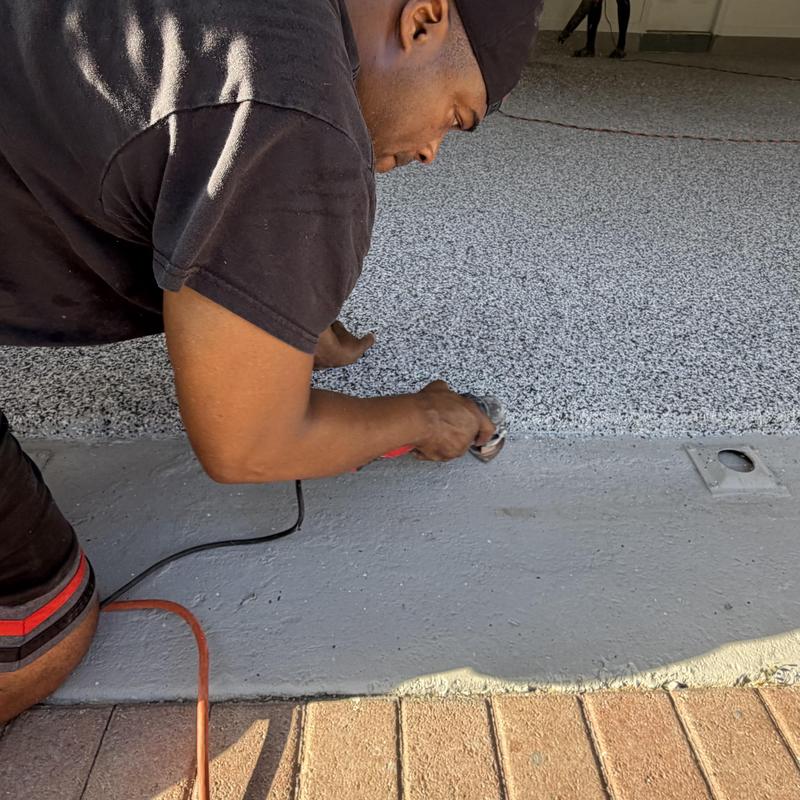 Epoxy flake garage floor with concrete grinding