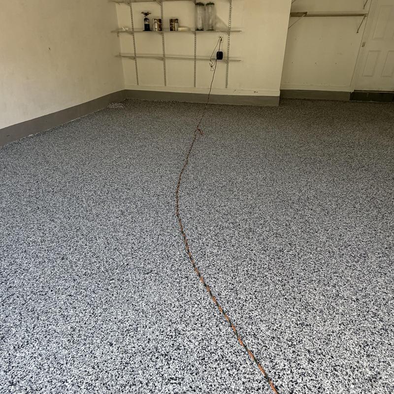Epoxy flake garage floor with gray tones